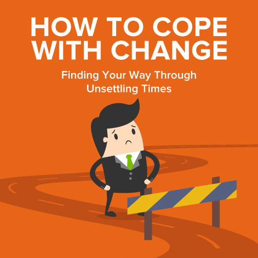 A puzzled worker standing on a road behind a hurdle.