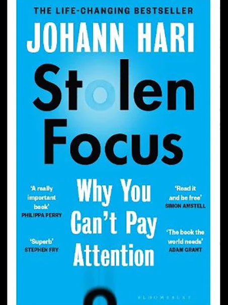 Stolen Focus Book Cover, light blue background heavy black type for title