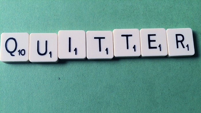 Quitter in scrabble tiles