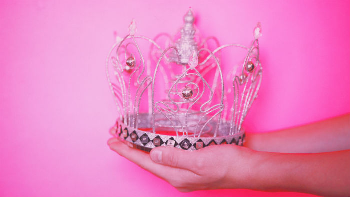 Princess crown on pink background