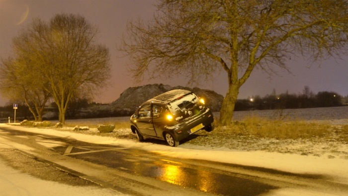 Car run off road in snow