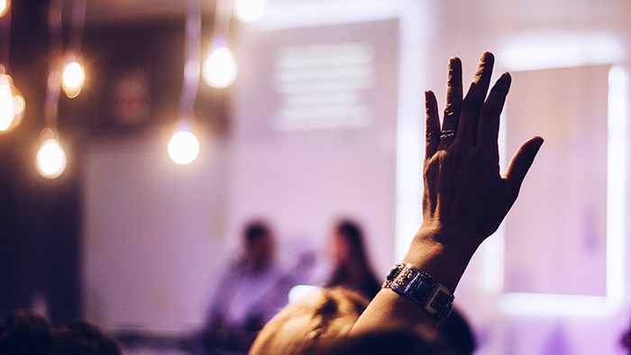 Someone raising their hand.