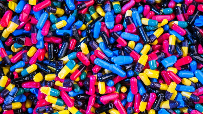 Hundreds of pill capsules
