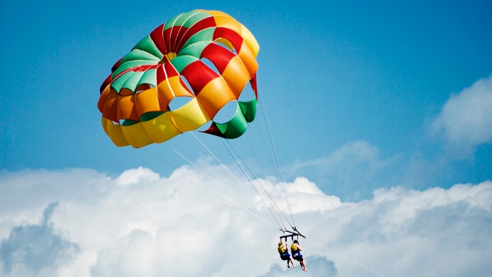 Two people parachuting. 
