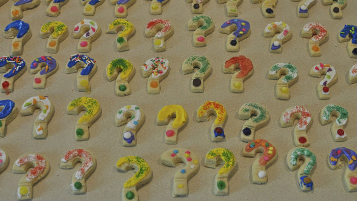 Different colored question marks.