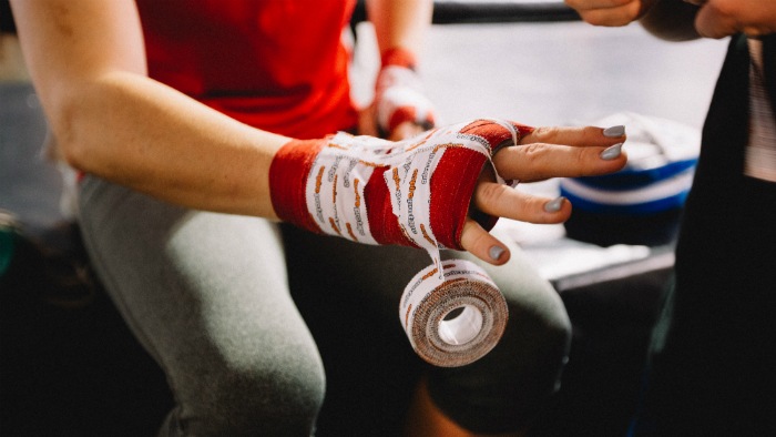 Boxer's hand being taped