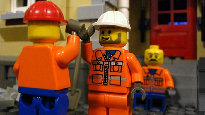 Lego figures high fiving